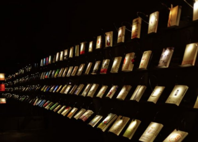 Wuguan Books is an experimental bookstore where readersshop in extreme darkness except for the dim spotlights on each of the book covers and reading lights on some desks. Wuguan Books is an experimental bookstore where readersshop in extreme darkness except for the dim spotlights on each of the book covers and reading lights on some desks.